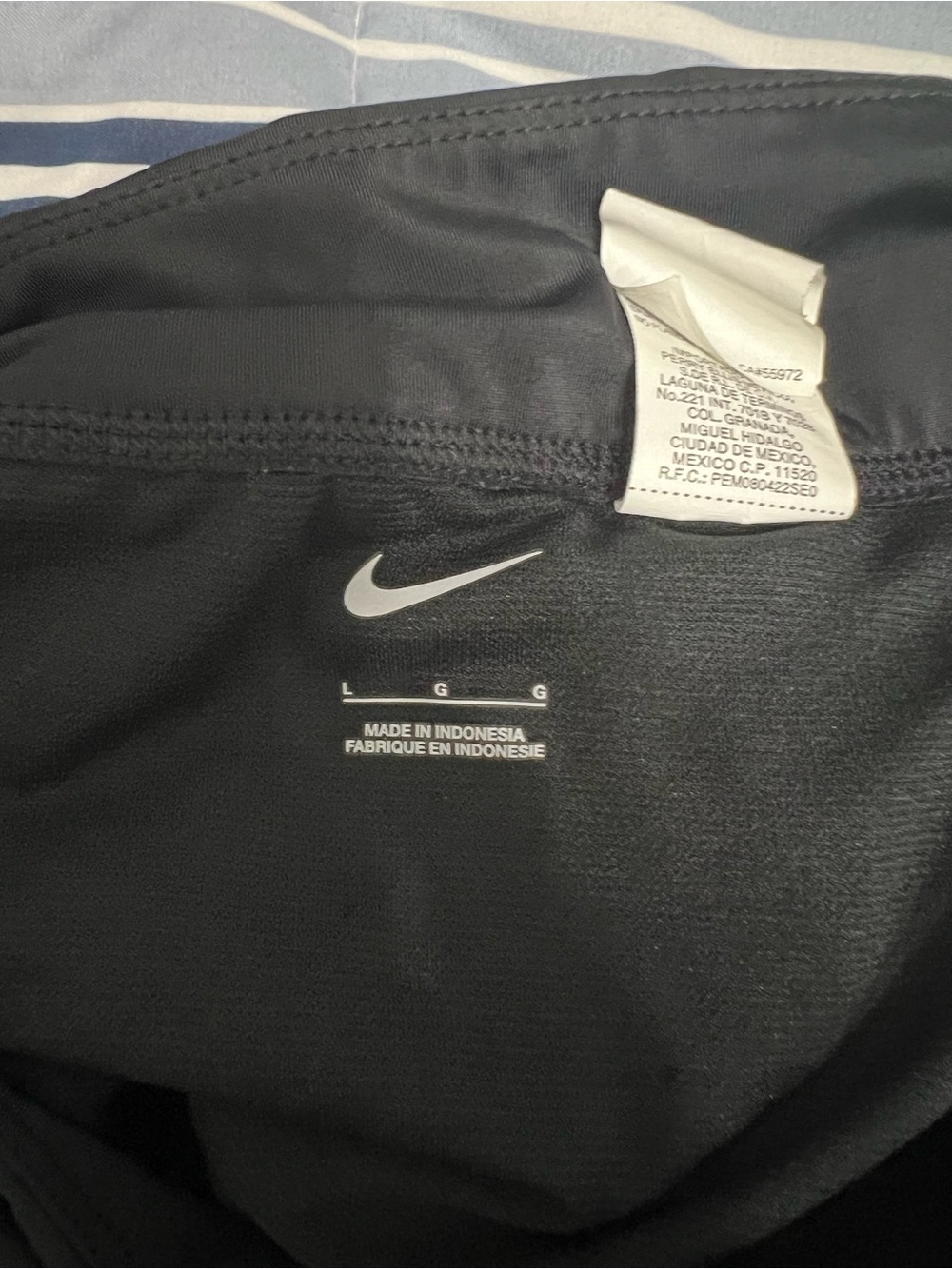 Nike Black Top with White Swoosh Logo